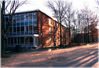 Hazardous materials workers outside dormitory at the State University of New York at New Paltz, January 1992. See photo tour for more info.